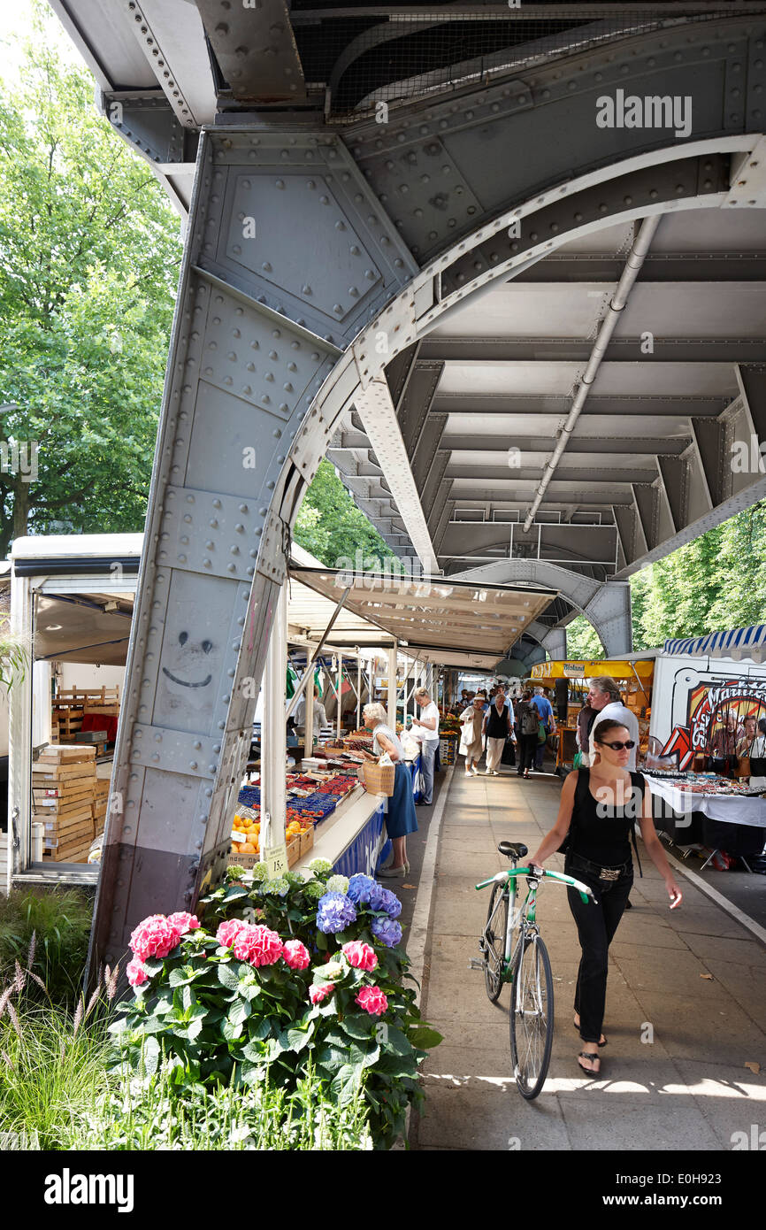 Market stalls below urban railway system, farmers market in Isestrasse, Eppendorf, Hamburg, Germany Stock Photo