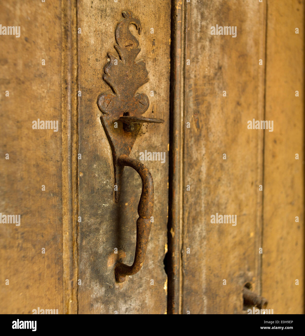 Old metal door latch and handle Stock Photo