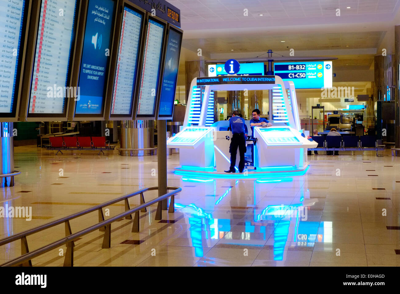 information boards and desk in the early hours of the morning at dubai international airport Stock Photo