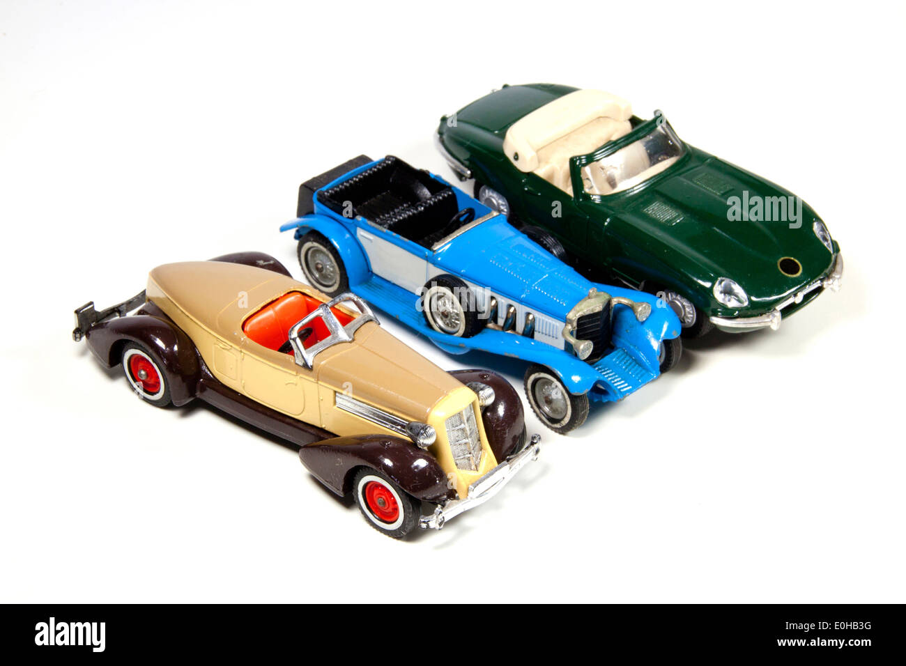 isolated collection of three toy model cars on white Stock Photo Alamy