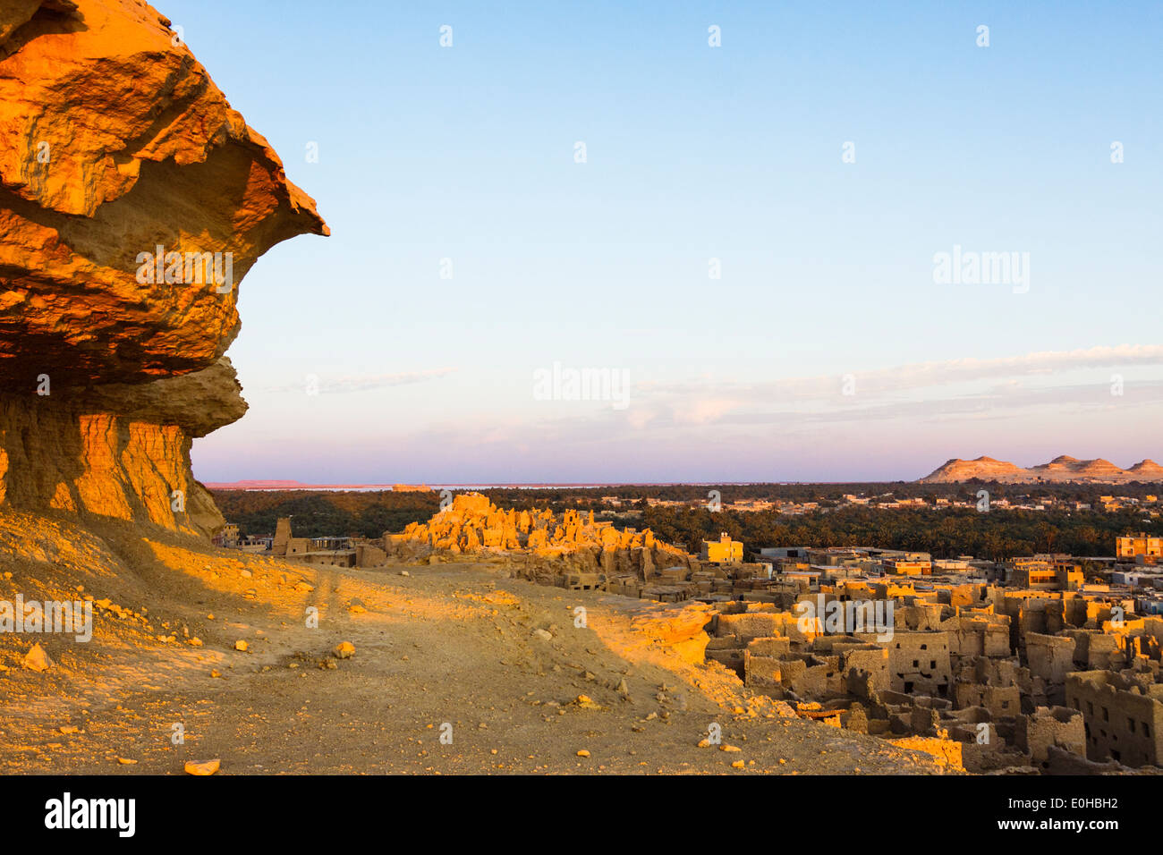 Overview of the remains of Shali fort and village at sunset. Siwa oasis, Egypt Stock Photo