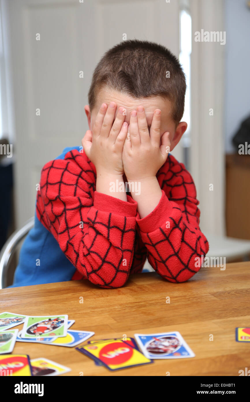 4 year old boy sulking Stock Photo Alamy