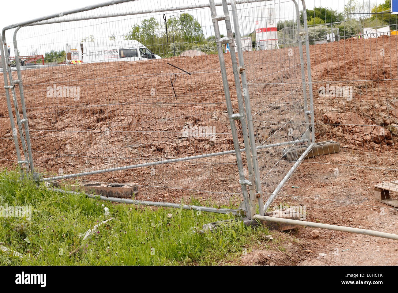 Construction site Heras fencing reinforced to give it stability and