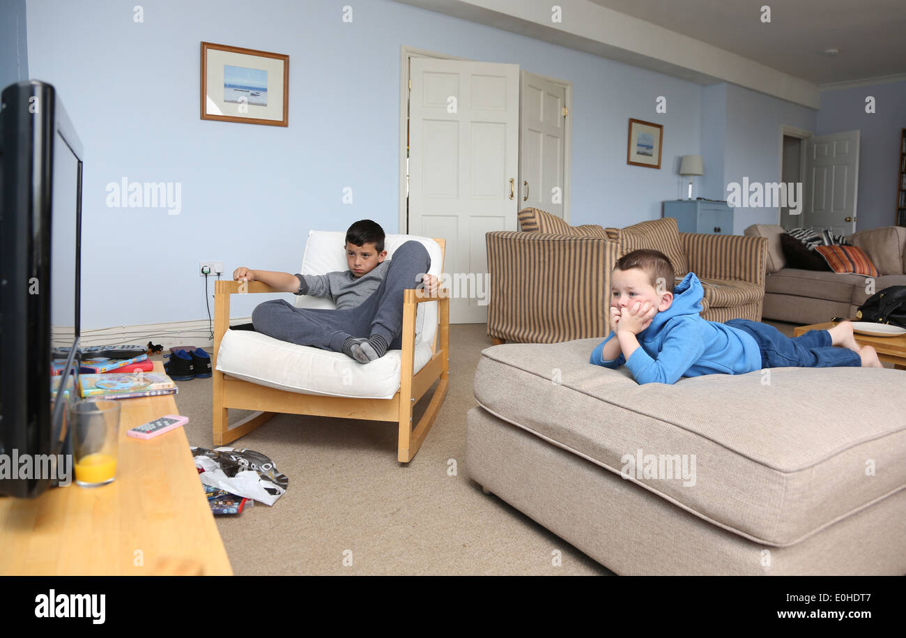 Children watching TV Stock Photo