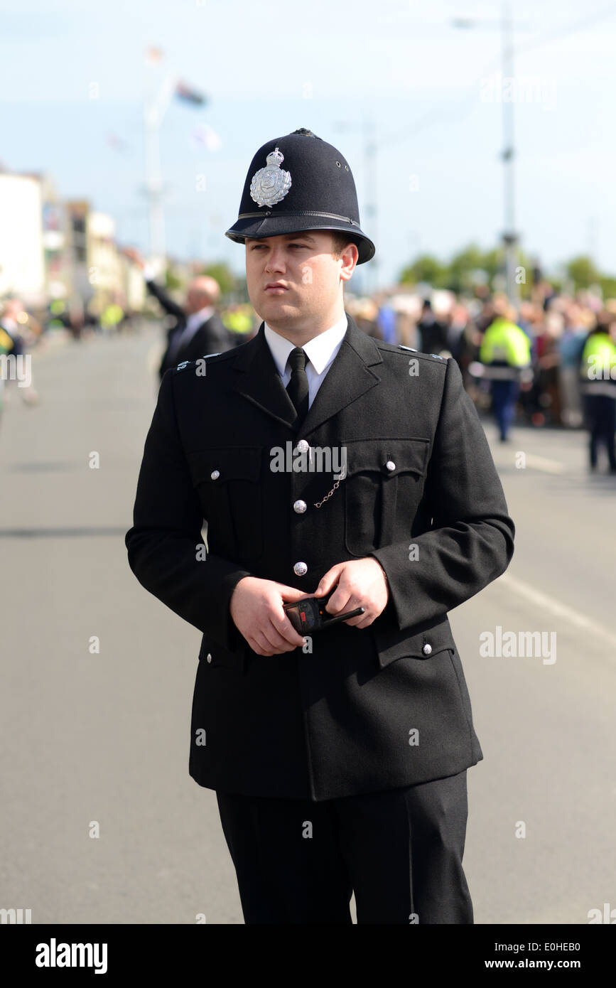 A modern day policeman on duty wearing a 1940's police uniform Stock Photo  - Alamy