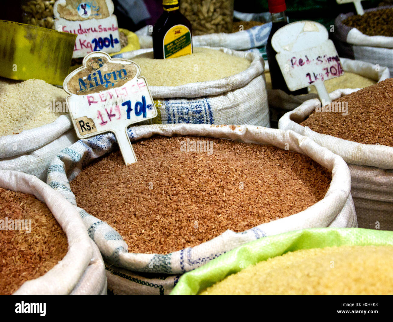 Different rice varieties at the market hall in Asia Stock Photo