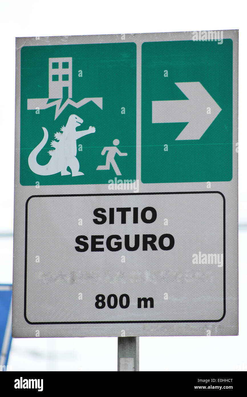 A sign indicating a safe evacuation zone in Quito, Ecuador Stock Photo