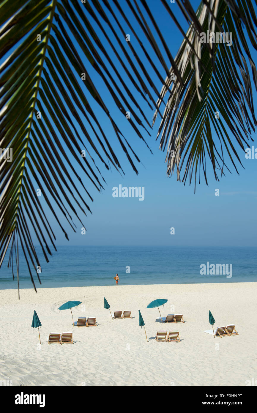 Tropical beach scene with beach chairs and umbrellas Ipanema Beach Rio de Janeiro Brazil Stock Photo