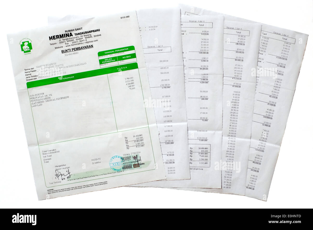 lengthy itemised hospital bill listing every item used and cost for a cesarean c section operation in malang east java indonesia Stock Photo