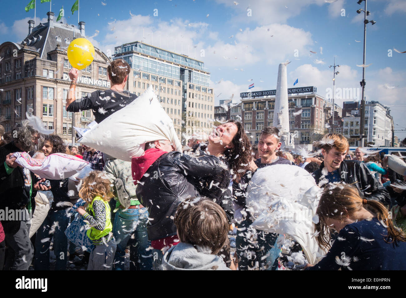 Flashmob pillowfight in Dam square amsterdam the netherlands Stock Photo