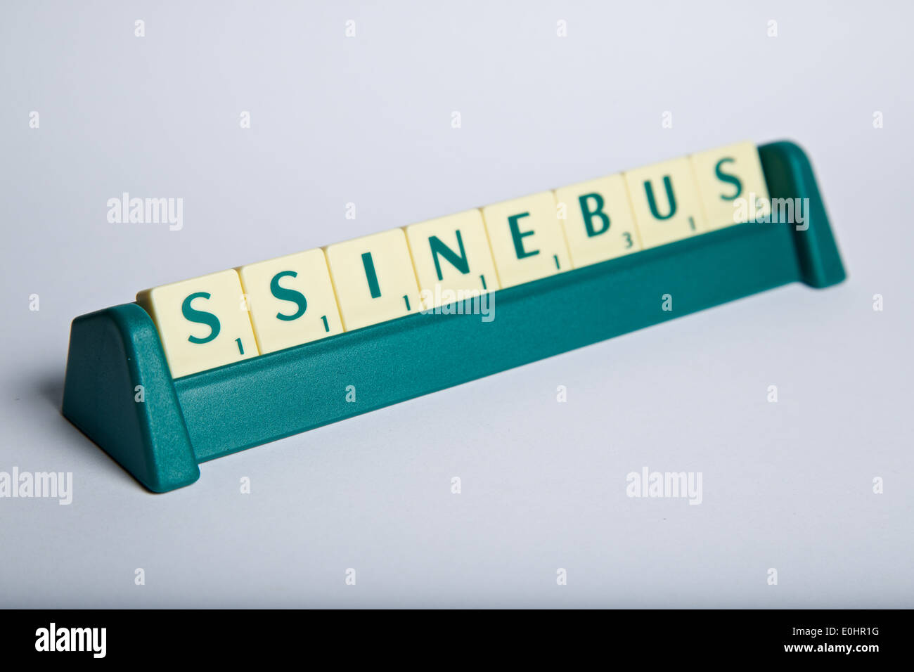 Scrabble tiles mixed up making the word business Stock Photo