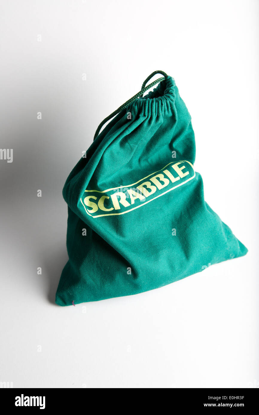 Green bag of scrabble letters Stock Photo