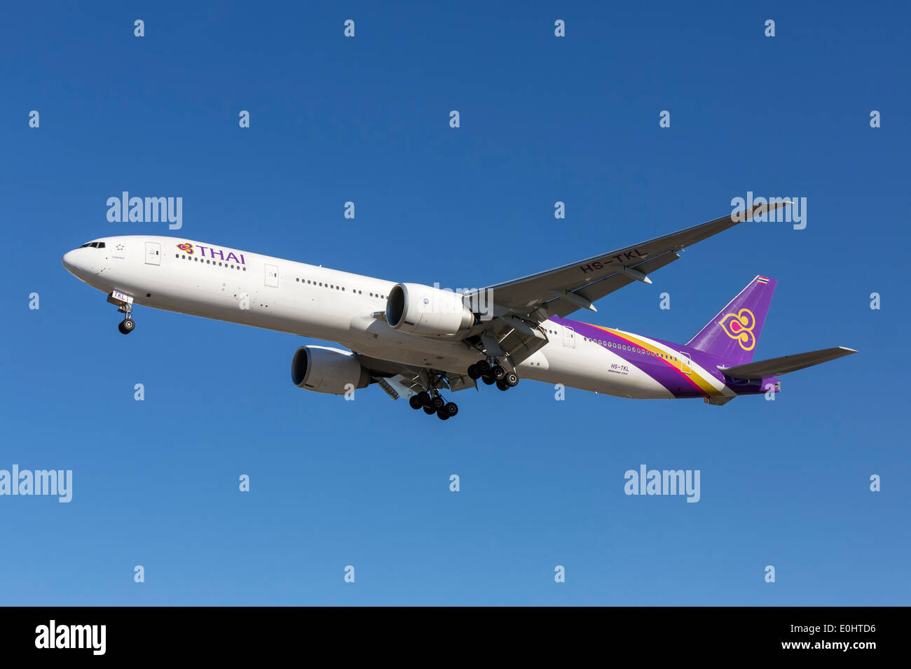 A Boeing B777 of Thai Airways on final approach Stock Photo
