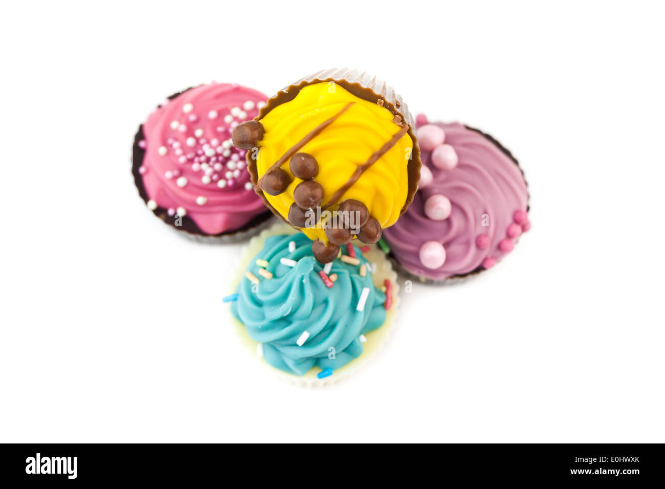 Stack of multicolored assorted cupcakes Stock Photo