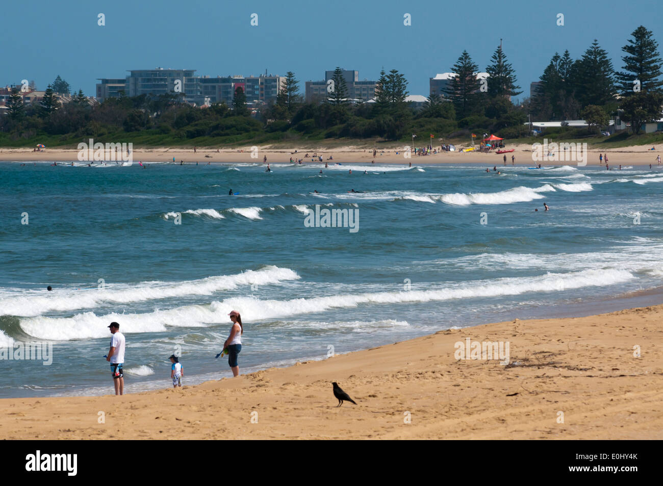 Tourists on the beach at Stockton, Newcastle, New South Wales, Australia. Stock Photo
