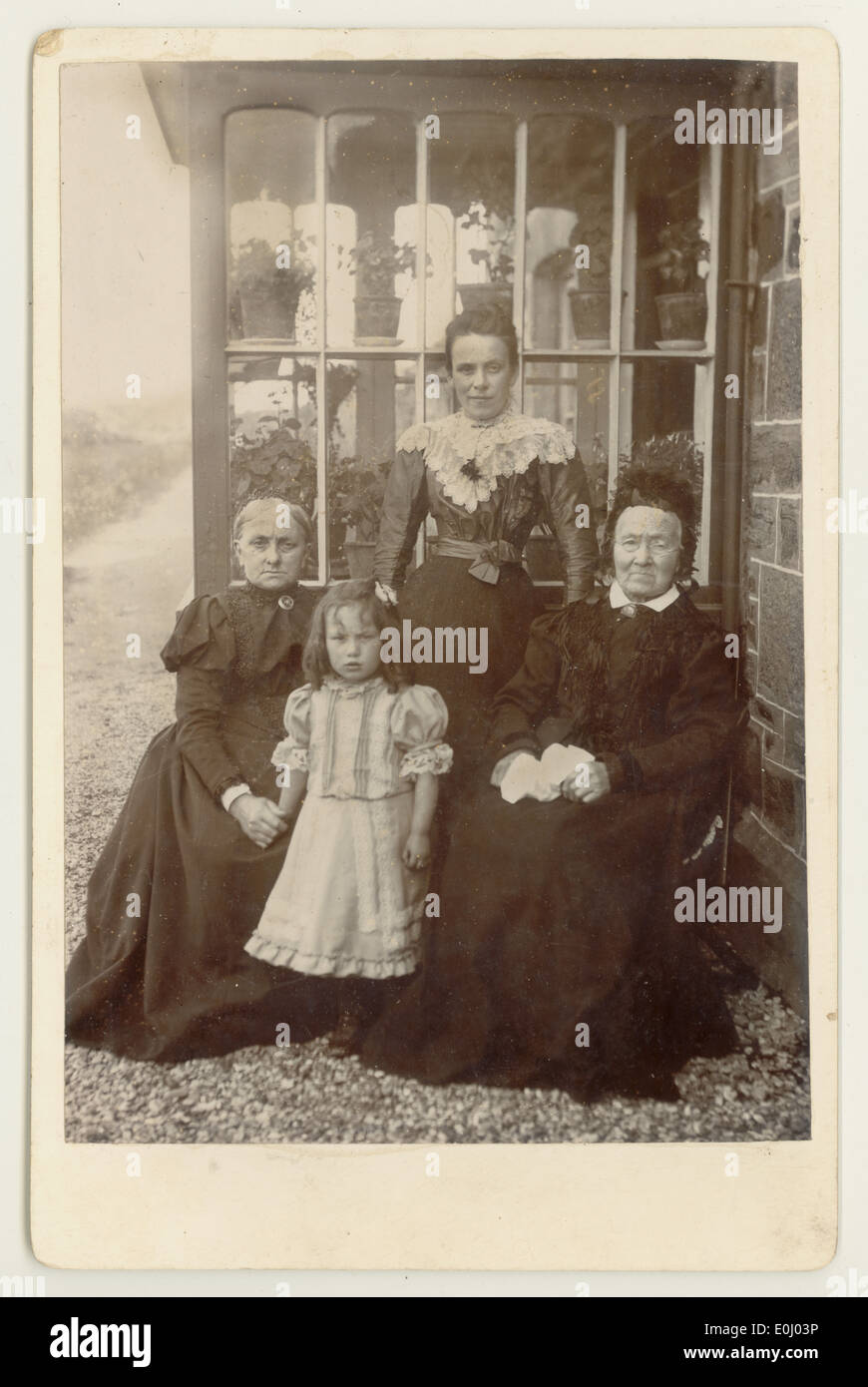 Cabinet photograph portrait  of a Victorian family, circa 1890's, U.K. Stock Photo