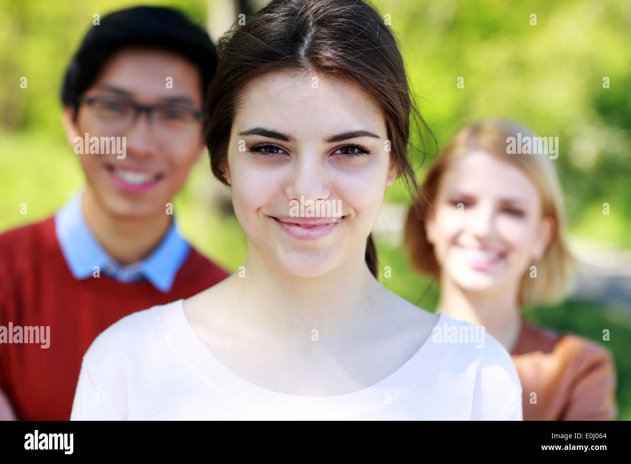 Group young people in park hi-res stock photography and images - Alamy