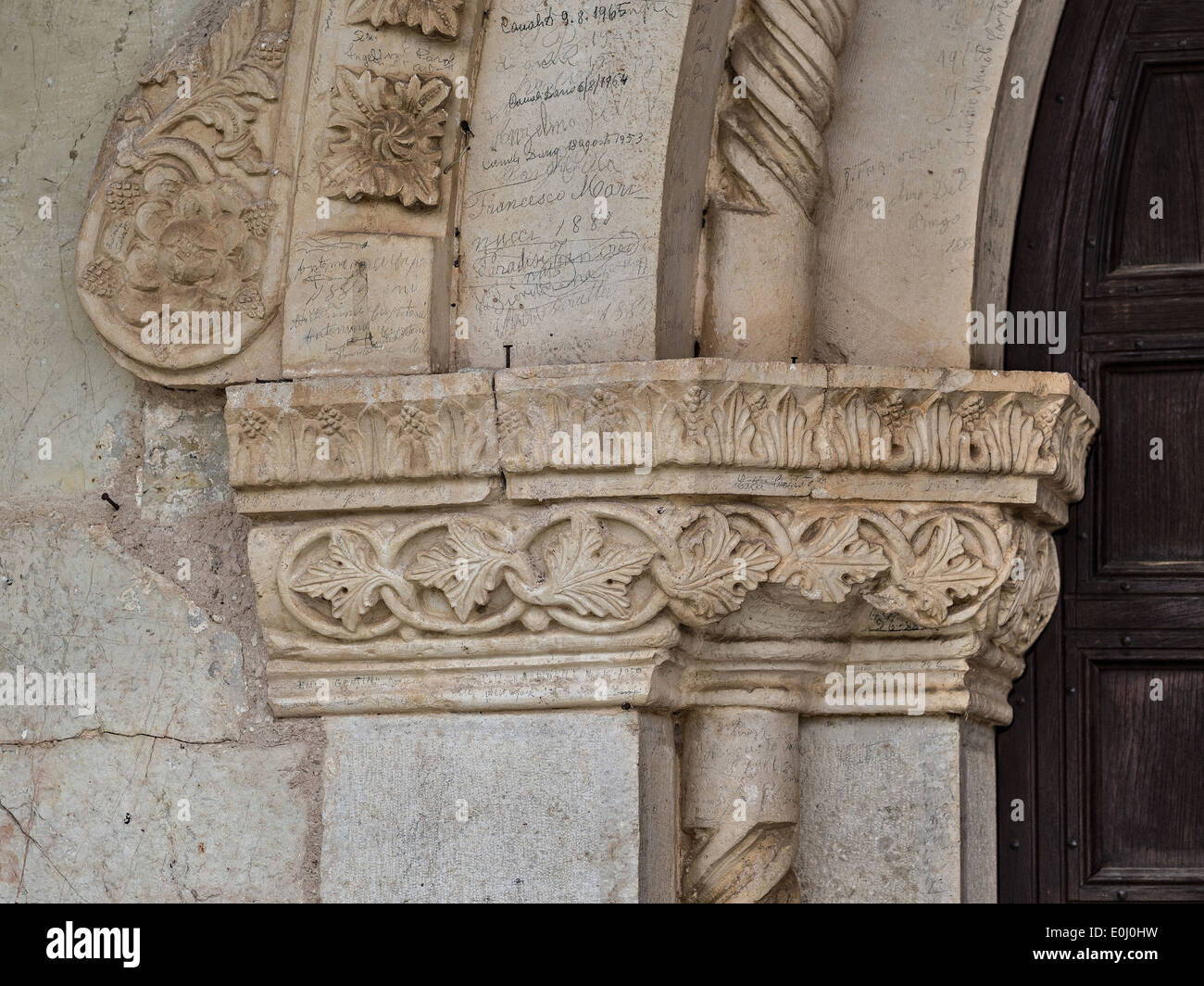 Campi di Norcia, Umbria, Italy; Church San Salvatore; detail of the portal Stock Photo