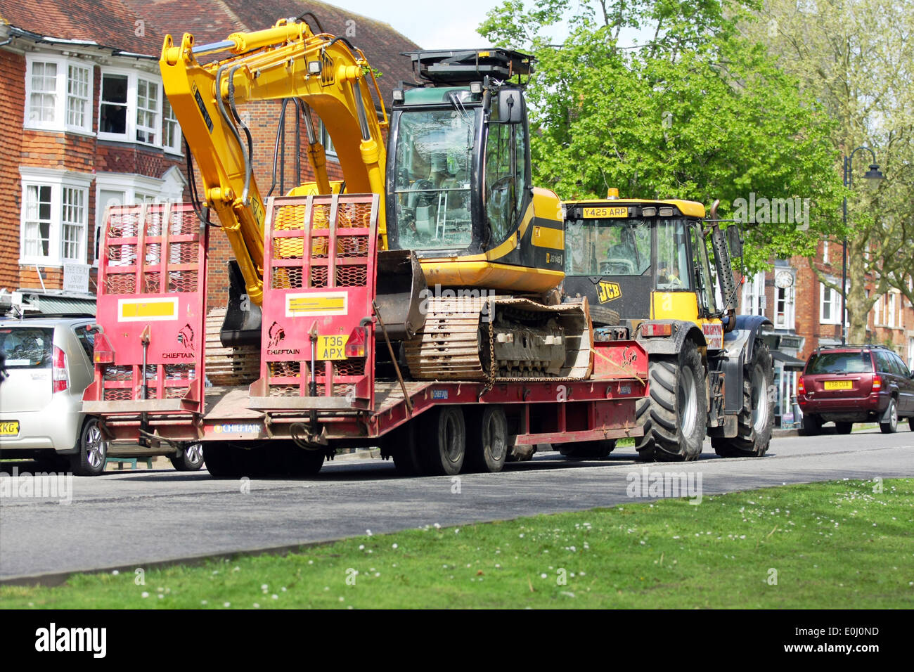 Excavator low loader trailer hires stock photography and images Alamy