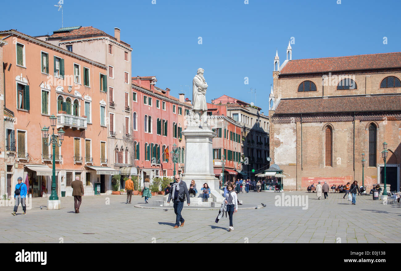 VENICE, ITALY - MARCH 12, 2014: Campo Francesco Moresini square and church St. Stephen (Santo Stefano) in background. Stock Photo