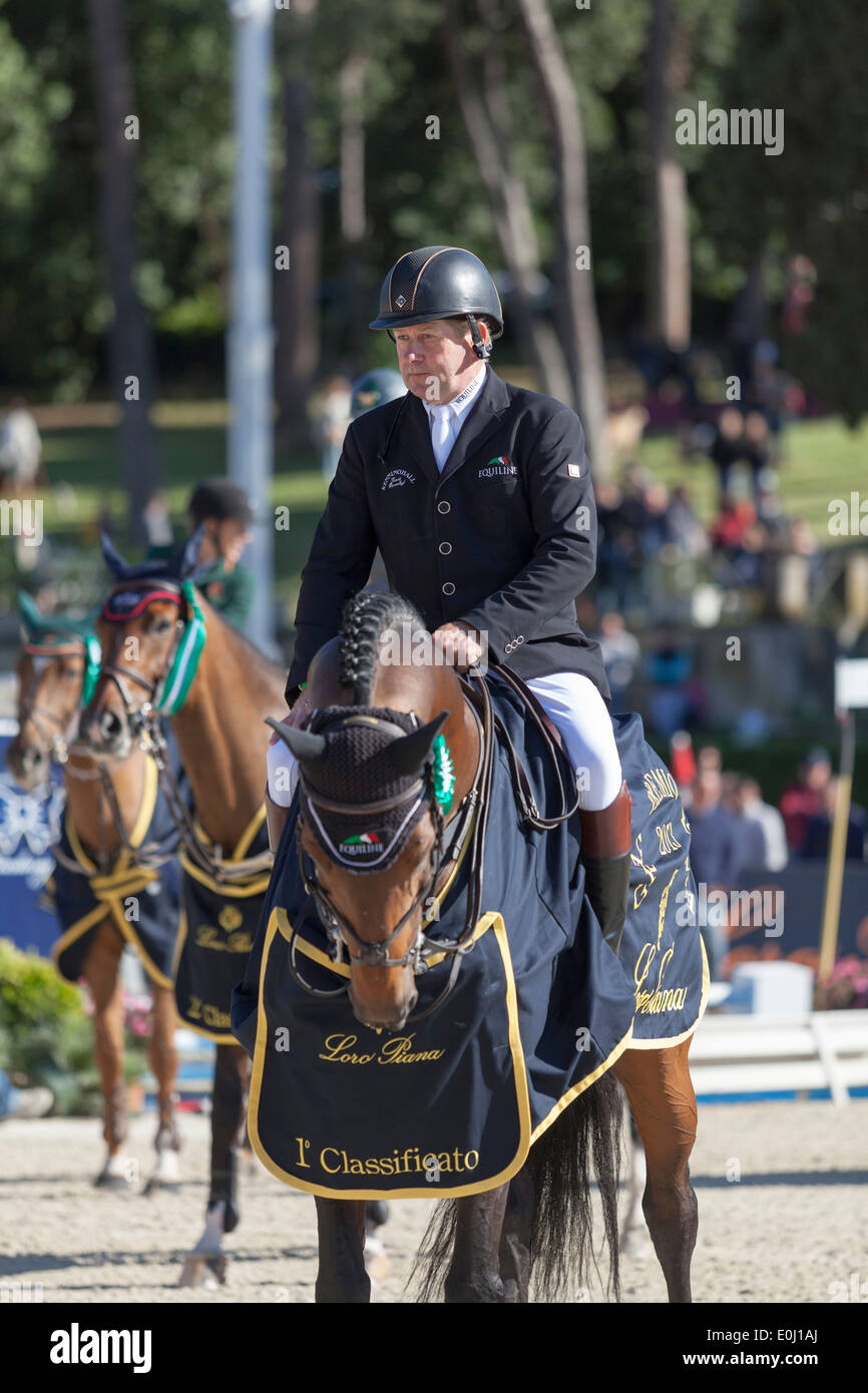 Nick Skelton on Big Star at Piazza di Sienna show jumping event Rome, 2013 Stock Photo