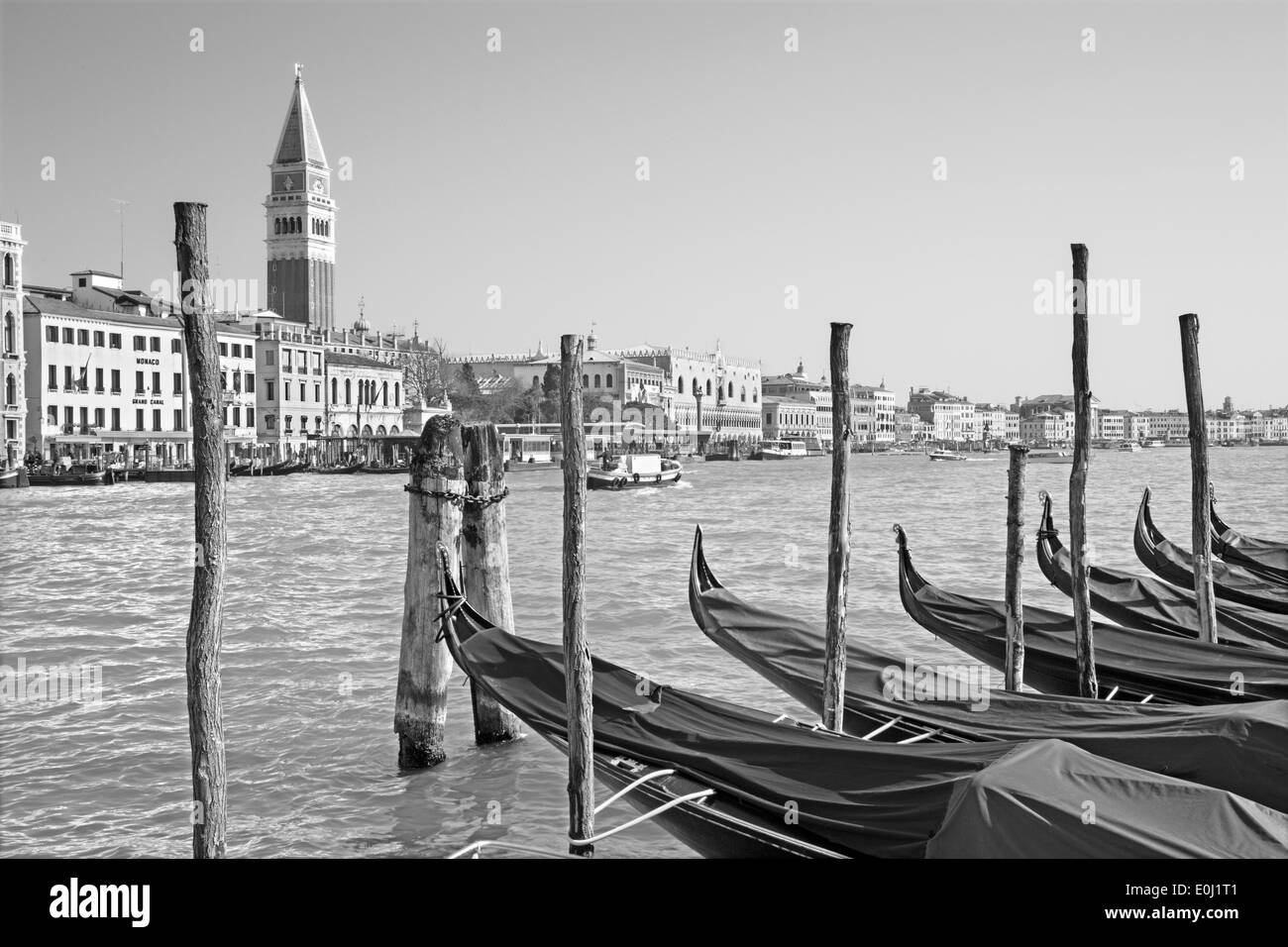 VENICE, ITALY - MARCH 13, 2014: Canal grande and boats for church Santa Maria della Salute. Stock Photo
