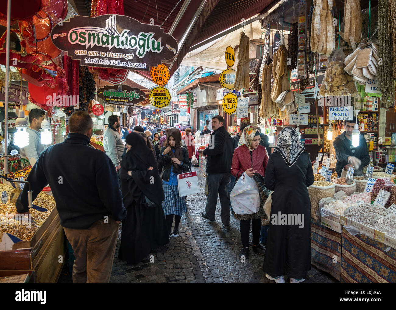 Market stalls on Hasircilar Caddesi at the entrance to the  Egyptian bazaar, AKA spice bazaar, Eminonu, Istanbul, Turkey. Stock Photo