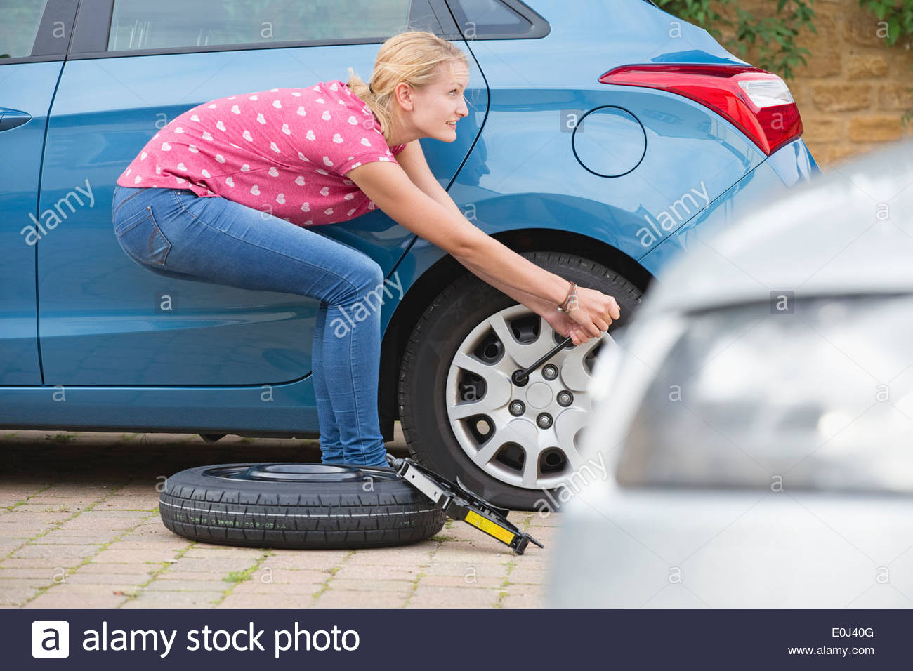Flat Tire Woman Stock Photos & Flat Tire Woman Stock Images Alamy