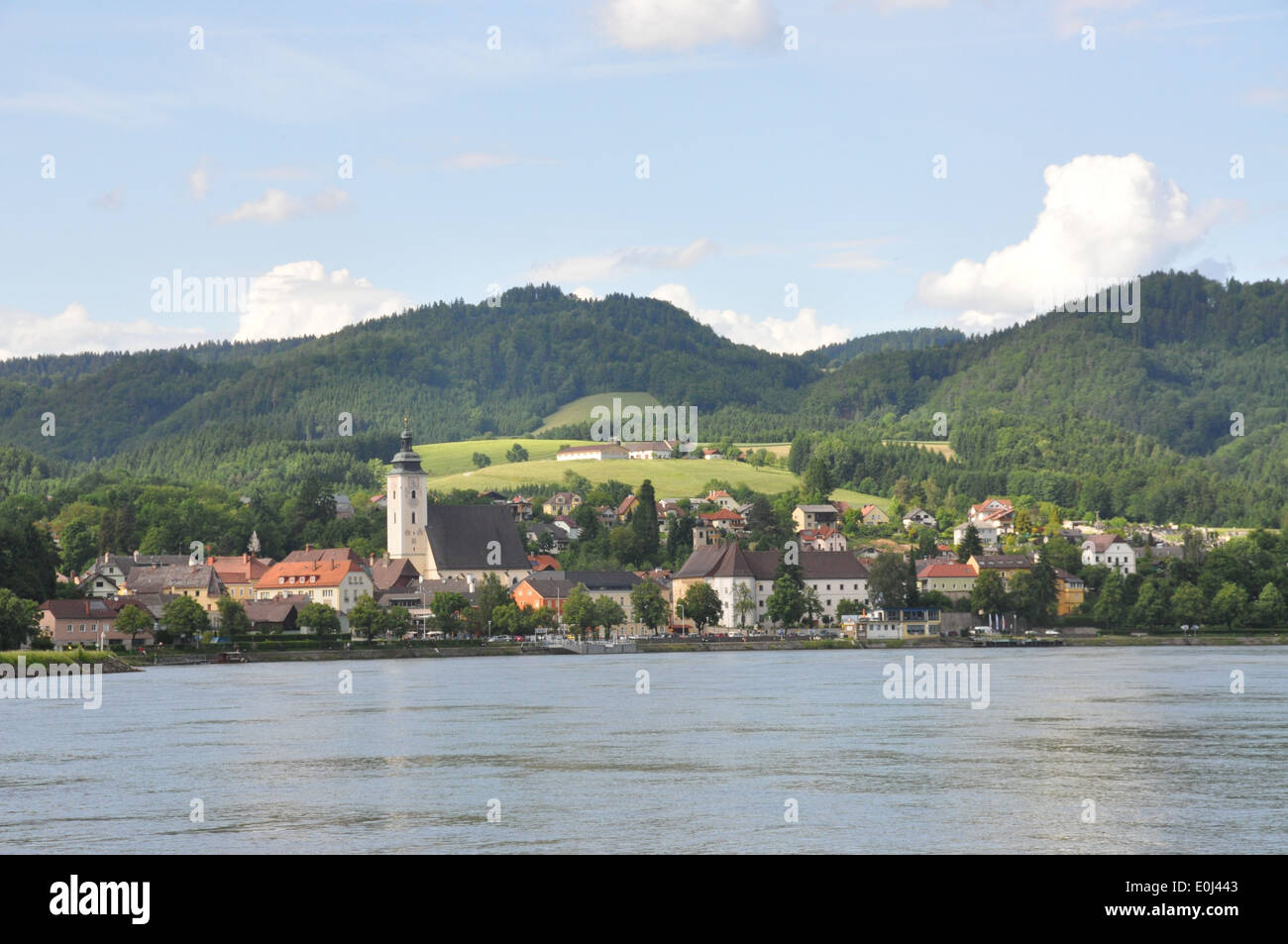 View of the scenic town of Grein from across the Danube River, Austria. Stock Photo