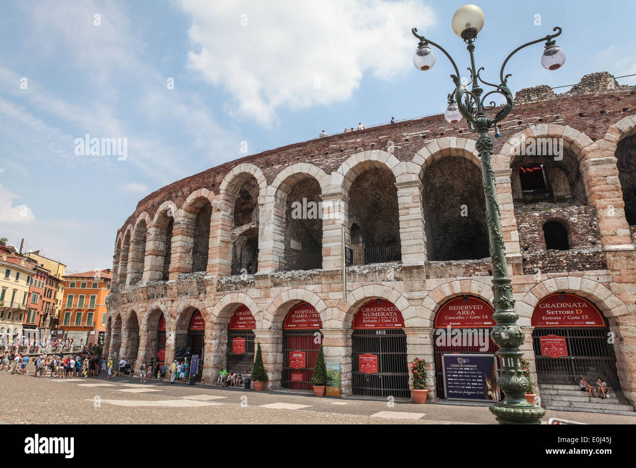 Verona Arena, famous Roman amphitheater on Piazza Bra in Verona, Italy,  with groups of tourists and surrounding buildings Stock Photo - Alamy