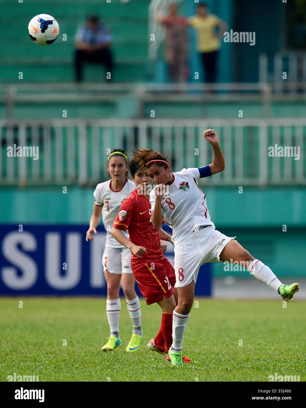 Ho Chi Minh City, Vietnam. 14th May, 2014. Jordan's Stephanie Mazen Yousef Alnaber (R) vies for the ball during the Group A match against Vietnam at the 2014 AFC Women's Asian Cup held at Thong Nhat Stadium in Ho Chi Minh city, Vietnam, May 14, 2014. Vietnam beat Jordan 3-1. © He Jingjia/Xinhua/Alamy Live News Stock Photo
