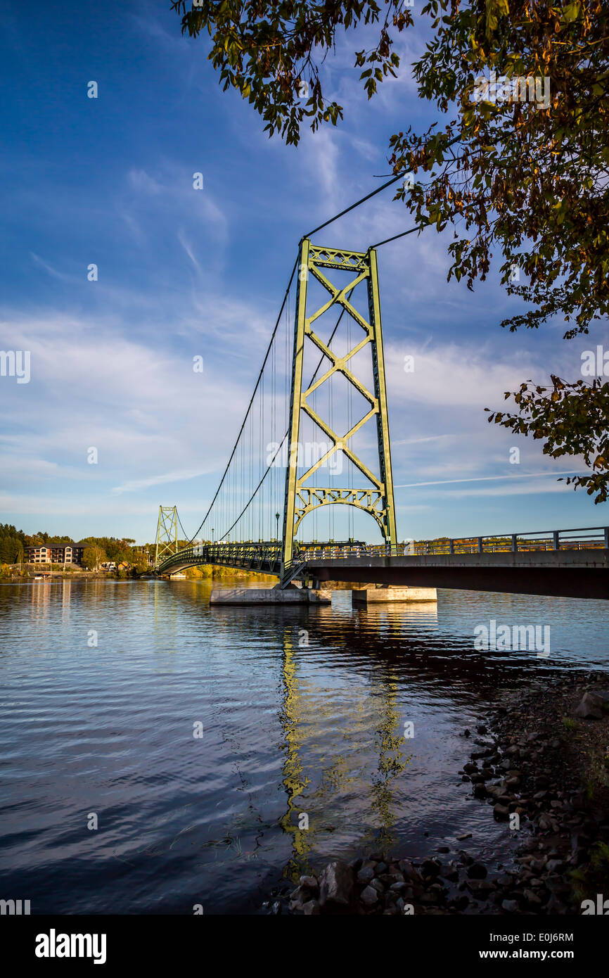 The suspension bridge over the  Saint-Maurice River at Grand- Mere, Quebec, Canada. Stock Photo