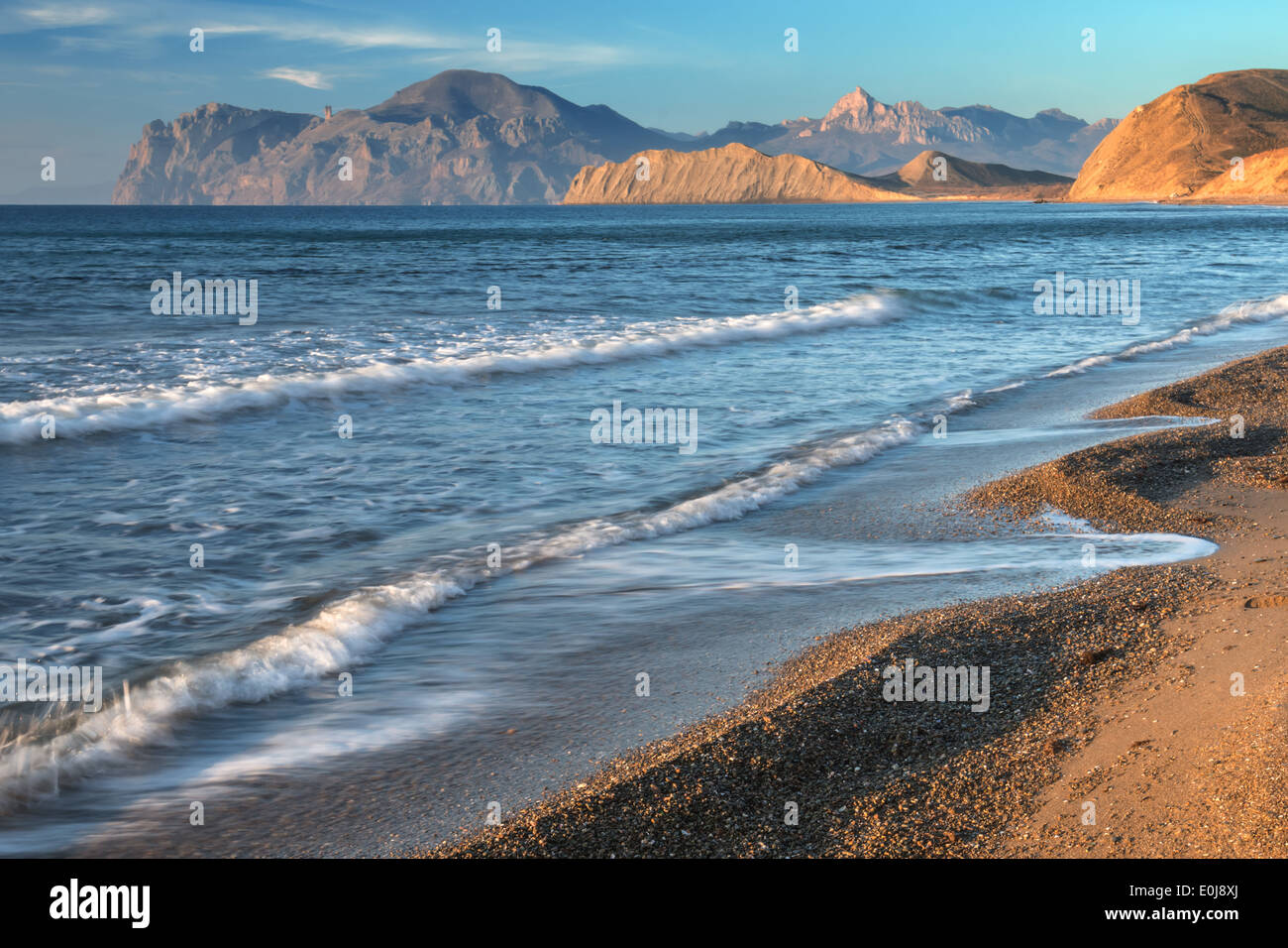 beach, rock and blue sky Stock Photo