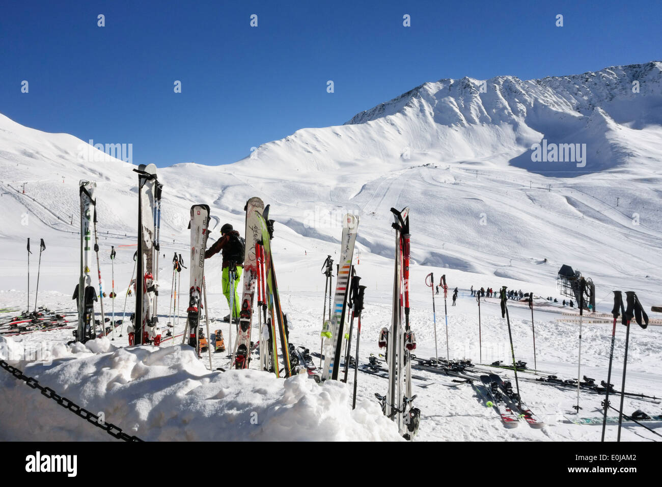 Skis standing in snow outside a ski restaurant on snow slopes in French Alps at Le Tour Chamonix-Mont-Blanc Haute Savoie France Stock Photo