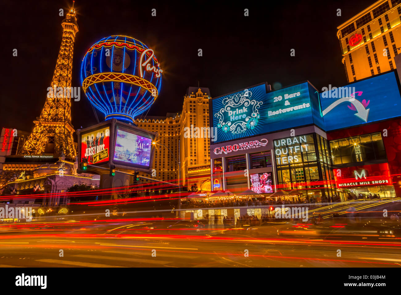 Night time landscape view of the Paris Hotel and Eiffel Tower miniature replica Las Vegas Nevada USA Stock Photo