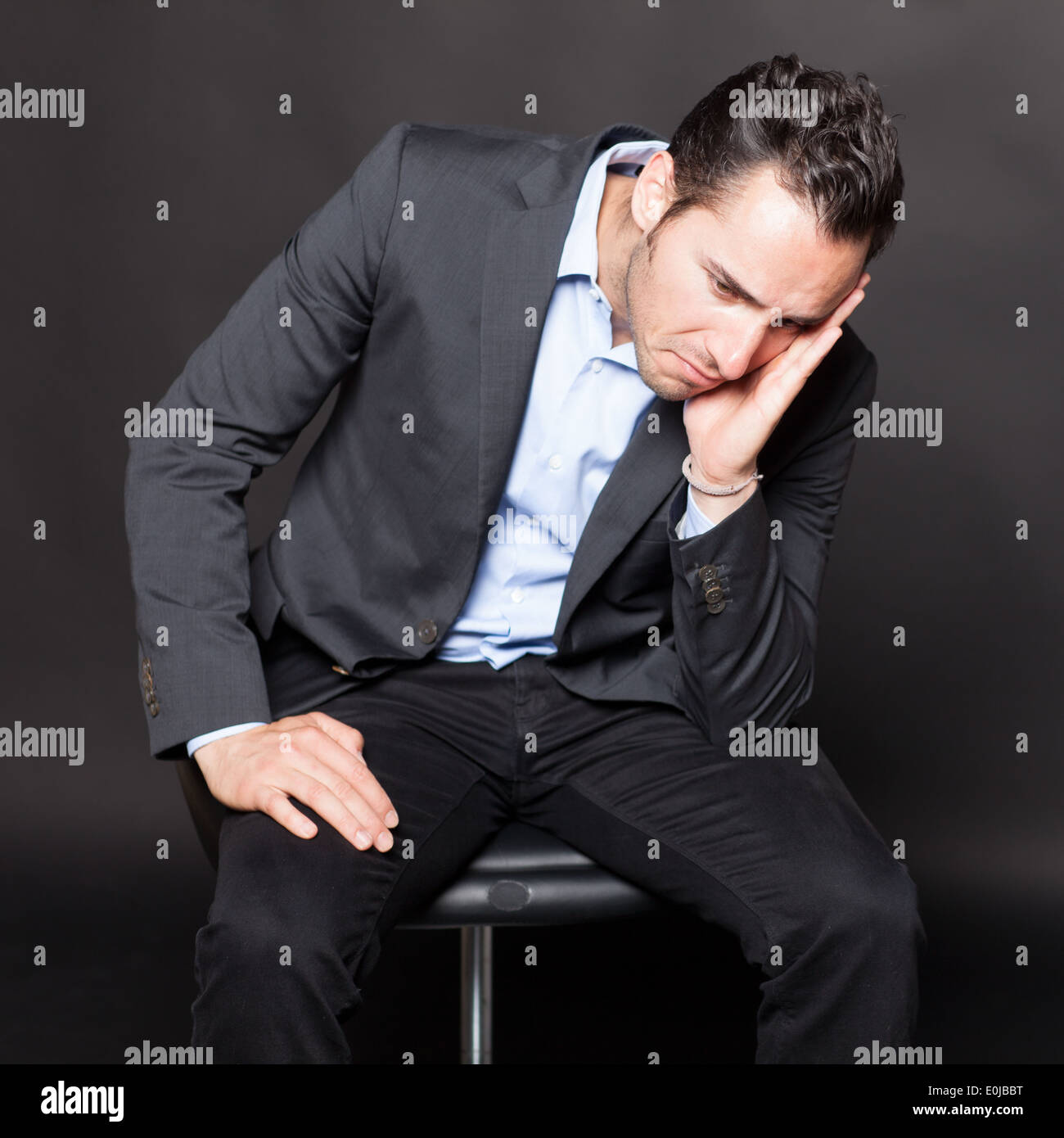 Depressed man hires stock photography and