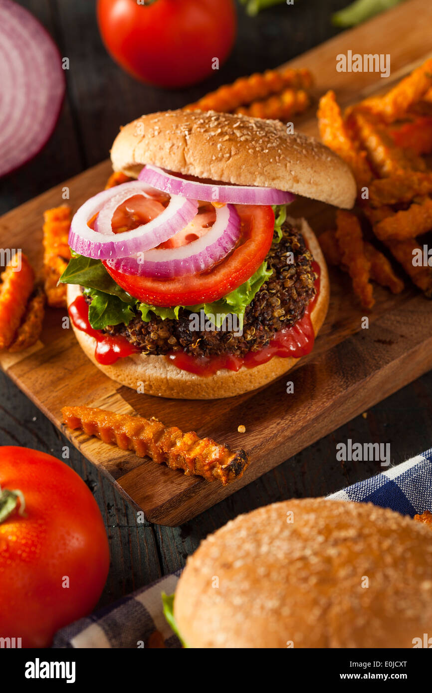 Homemade Healthy Vegetarian Quinoa Burger with Lettuce and Tomato Stock Photo