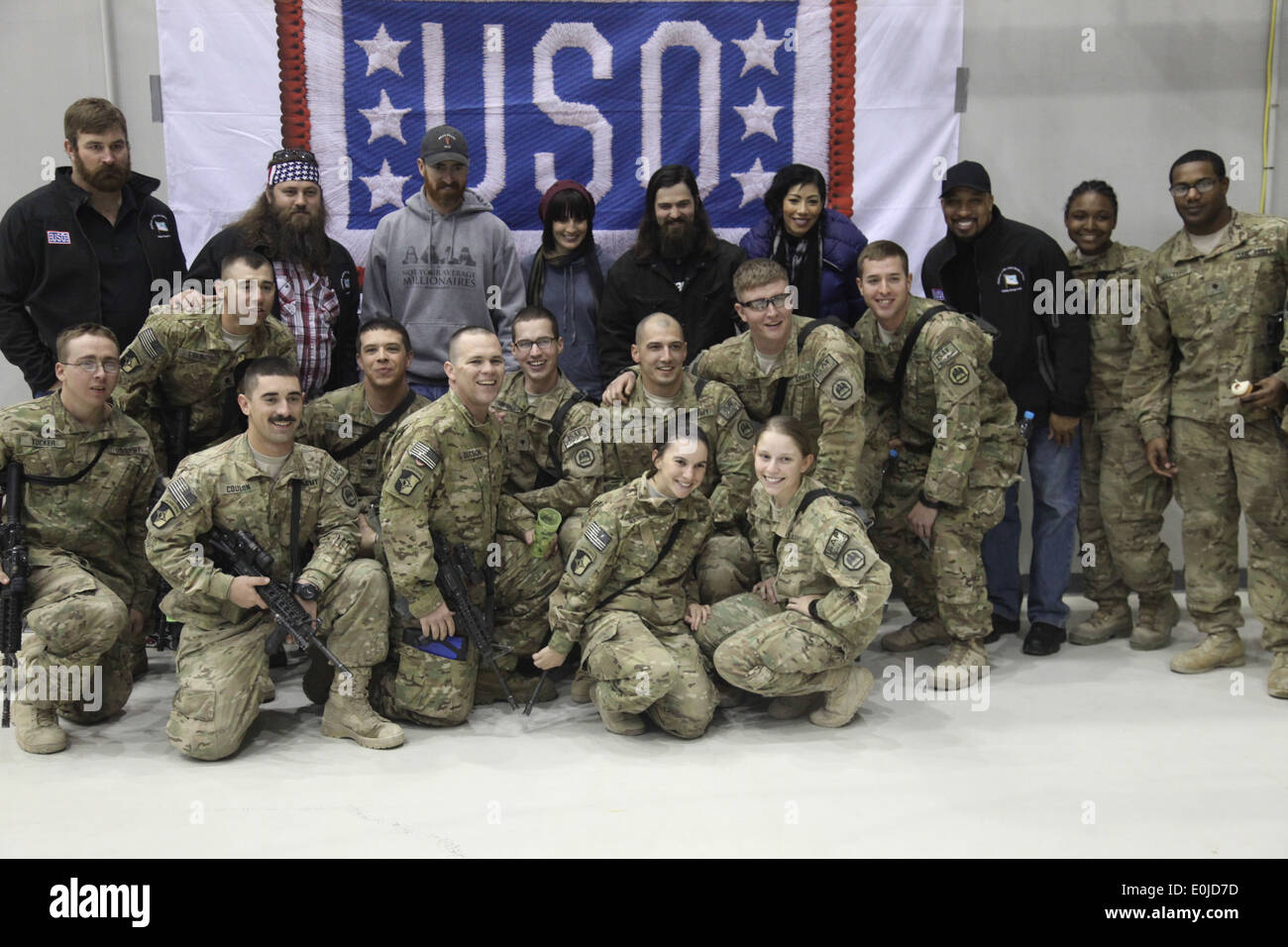 USO Tour celebrities pose for group photos at the end of the Holiday Troop Visit, USO show held on Bagram Air Force Base, Decem Stock Photo