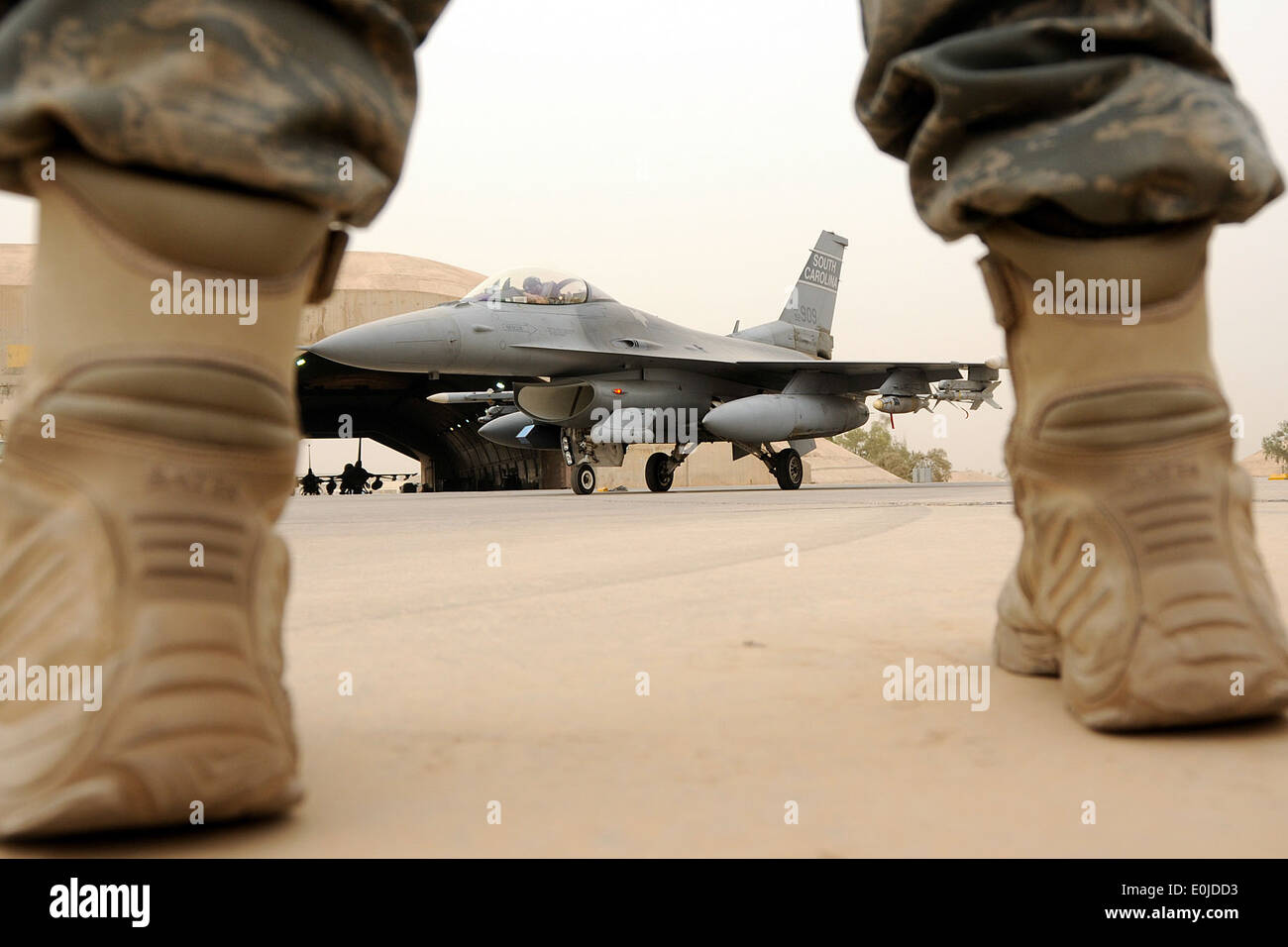 Senior Airman Brandon Bruce, a crew chief with the 169th Aircraft Maintenance Squadron at McEntire Joint National Guard Base, S port of OIF. (U.S. Air Force photo/Tech. Sgt. Caycee Cook/Released) Stock Photo