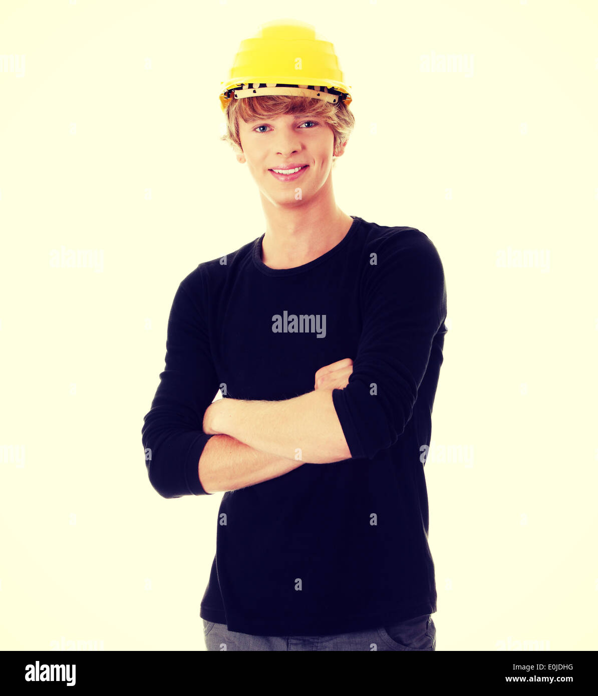 Young man in yellow helmet Stock Photo - Alamy