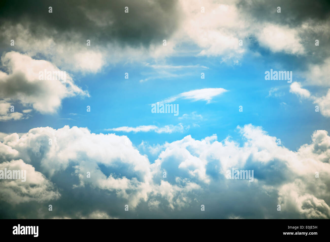 Blue break in the clouds Stock Photo