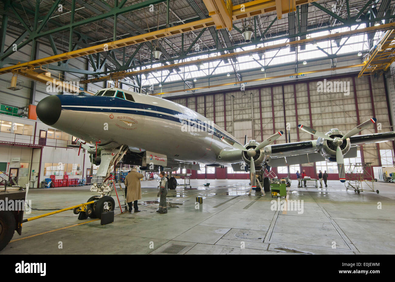 The historic passenger aircraft Lockheed Super Constellation L-1049 'HB-RSC' during maintenance in a hangar in Zurich/Kloten. Stock Photo