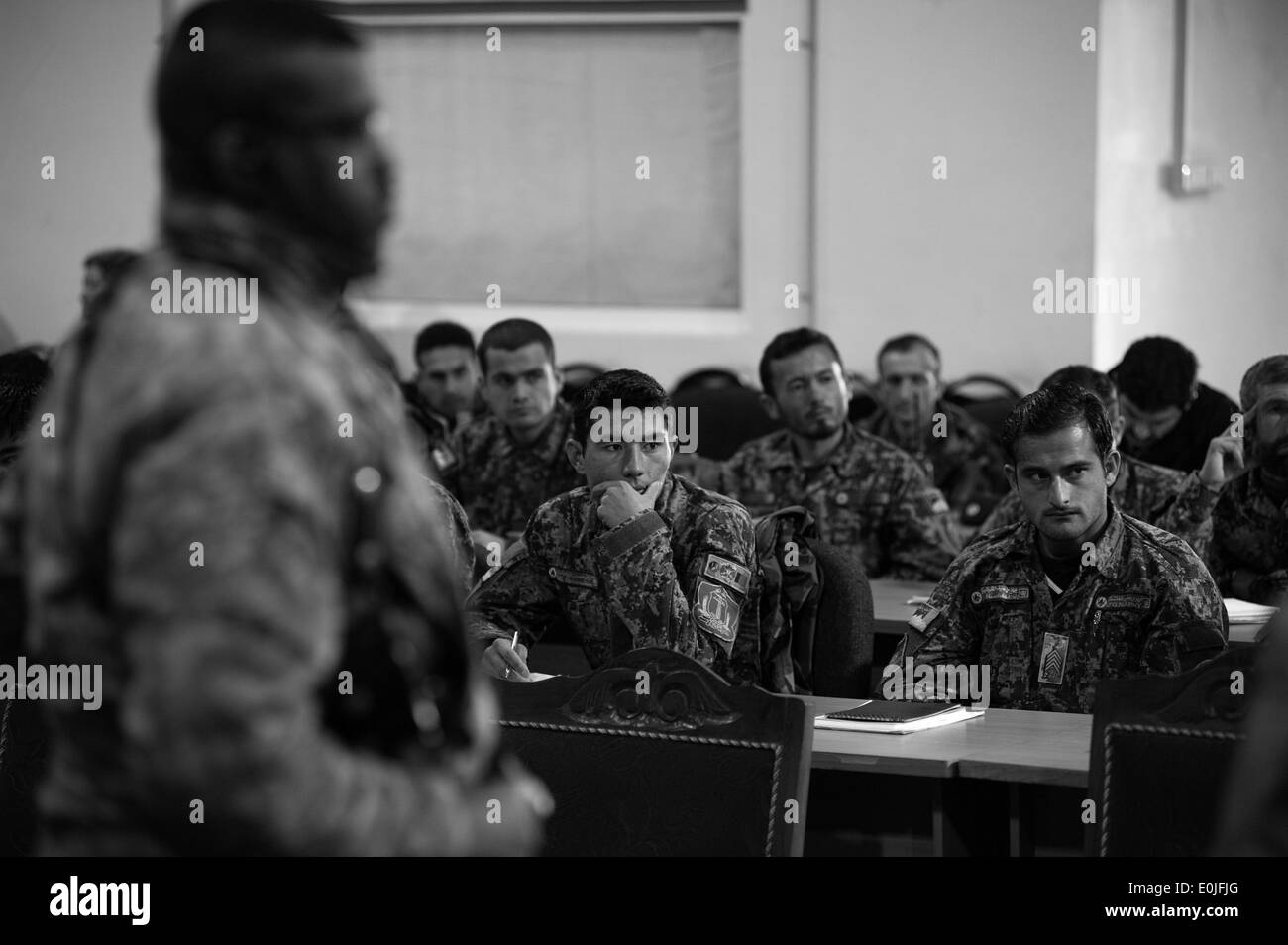 KABUL, Afghanistan (Feb. 8, 2011) - Afghan National Army recruiters sit in class Feb. 8, 2011 in Kabul, Afghanistan. NATO Train Stock Photo