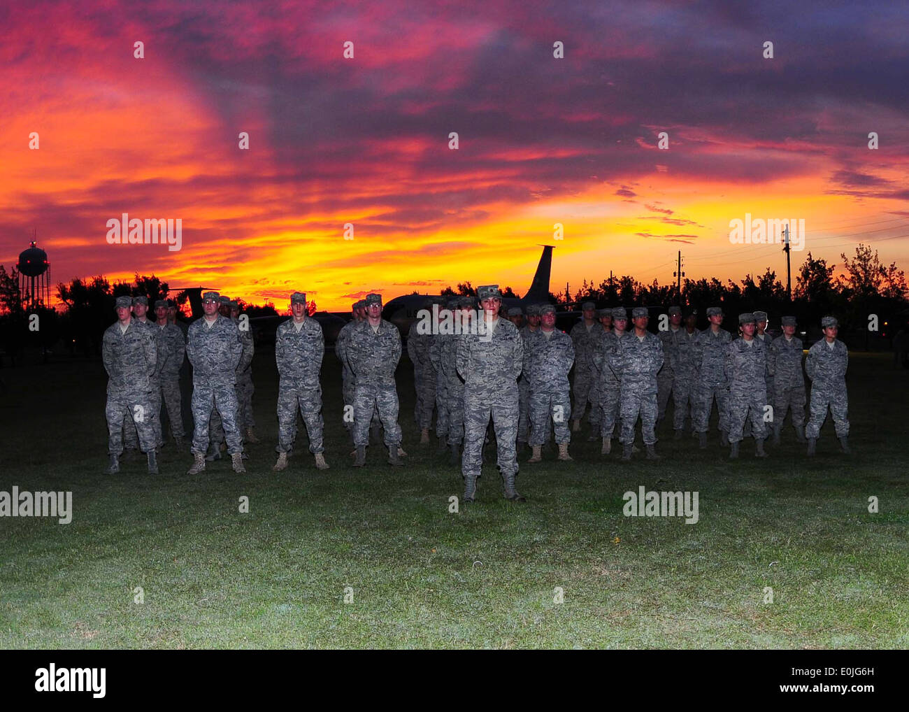 ALTUS AIR FORCE BASE, Okla.--Members of the 97th Air Mobility Wing stand at parade rest during the Prisoners of War/Missing in Stock Photo