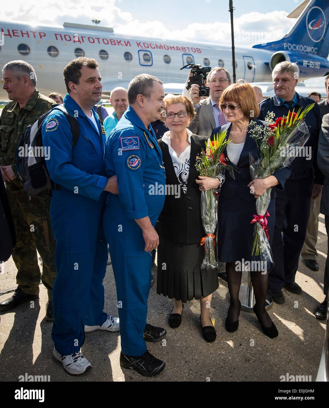 ISS Expedition 39 Flight Engineer Mikhail Tyurin of the Russian Federal Space Agency is welcomed home upon his return at Chkalovsky Airport a few hours after landing in the Soyuz TMA-11M spacecraft in Kazakhstan May 14, 2014 in Moscow, Russia. Wakata, Tyurin and Mastracchio returned to Earth after more than six months onboard the International Space Station where they served as members of the Expedition 38 and 39 crew. Stock Photo