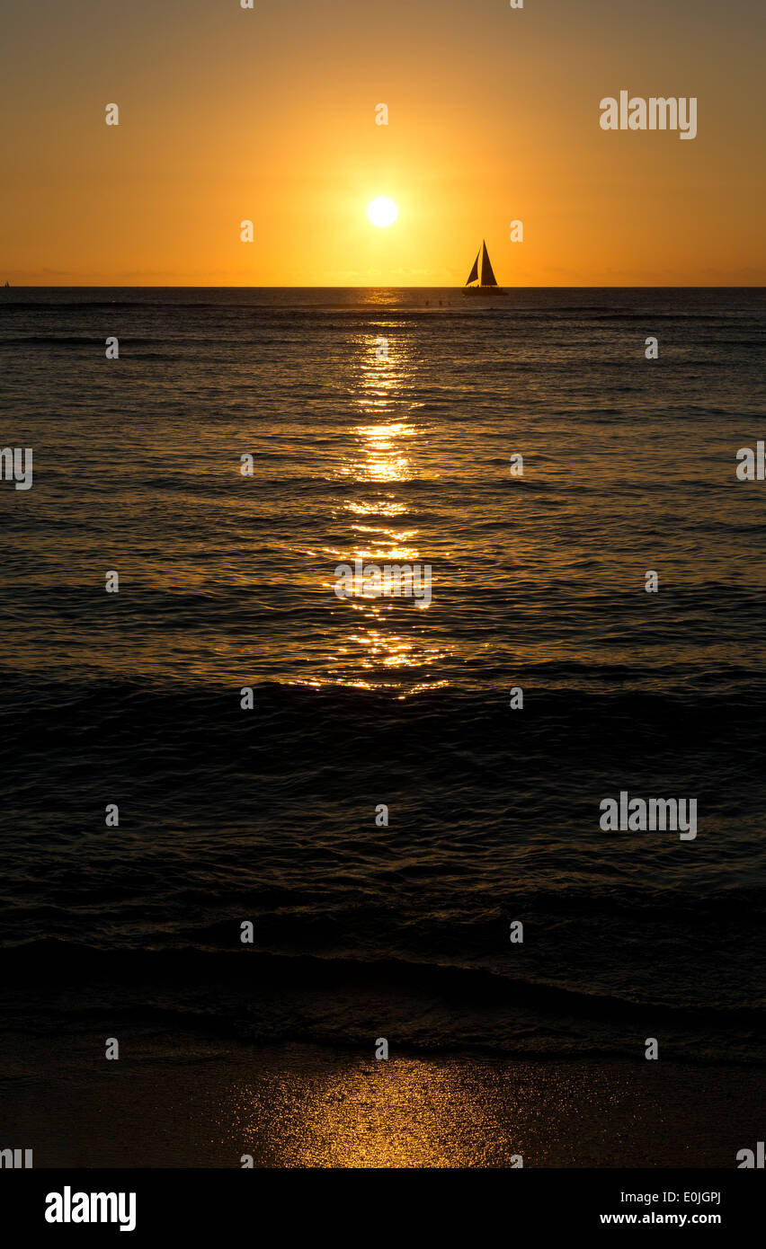 Sail boat and golden sunset Oahu, Hawaii Stock Photo Alamy