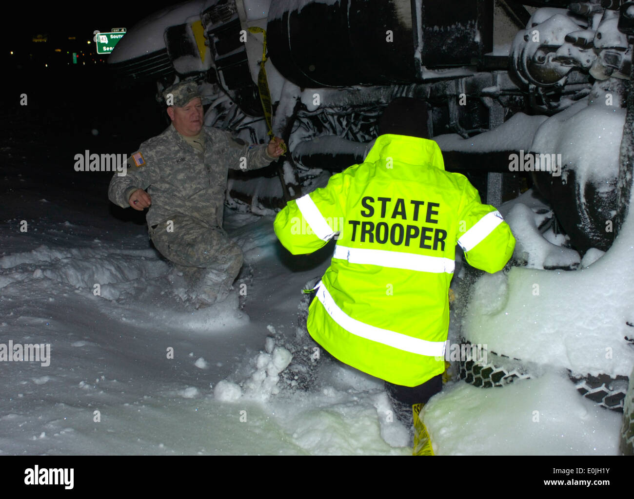 The Missouri National Guard responded to a large winter storm that covered most of Missouri, including Joplin. The 294th Engin Stock Photo