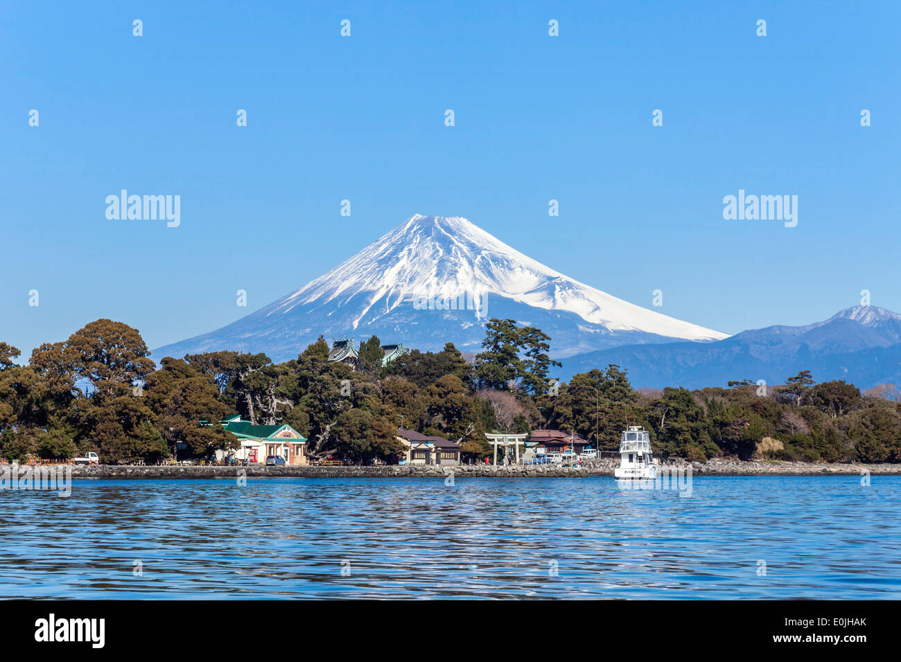 Snow capped Mt. Fuji and sea in Japan Stock Photo