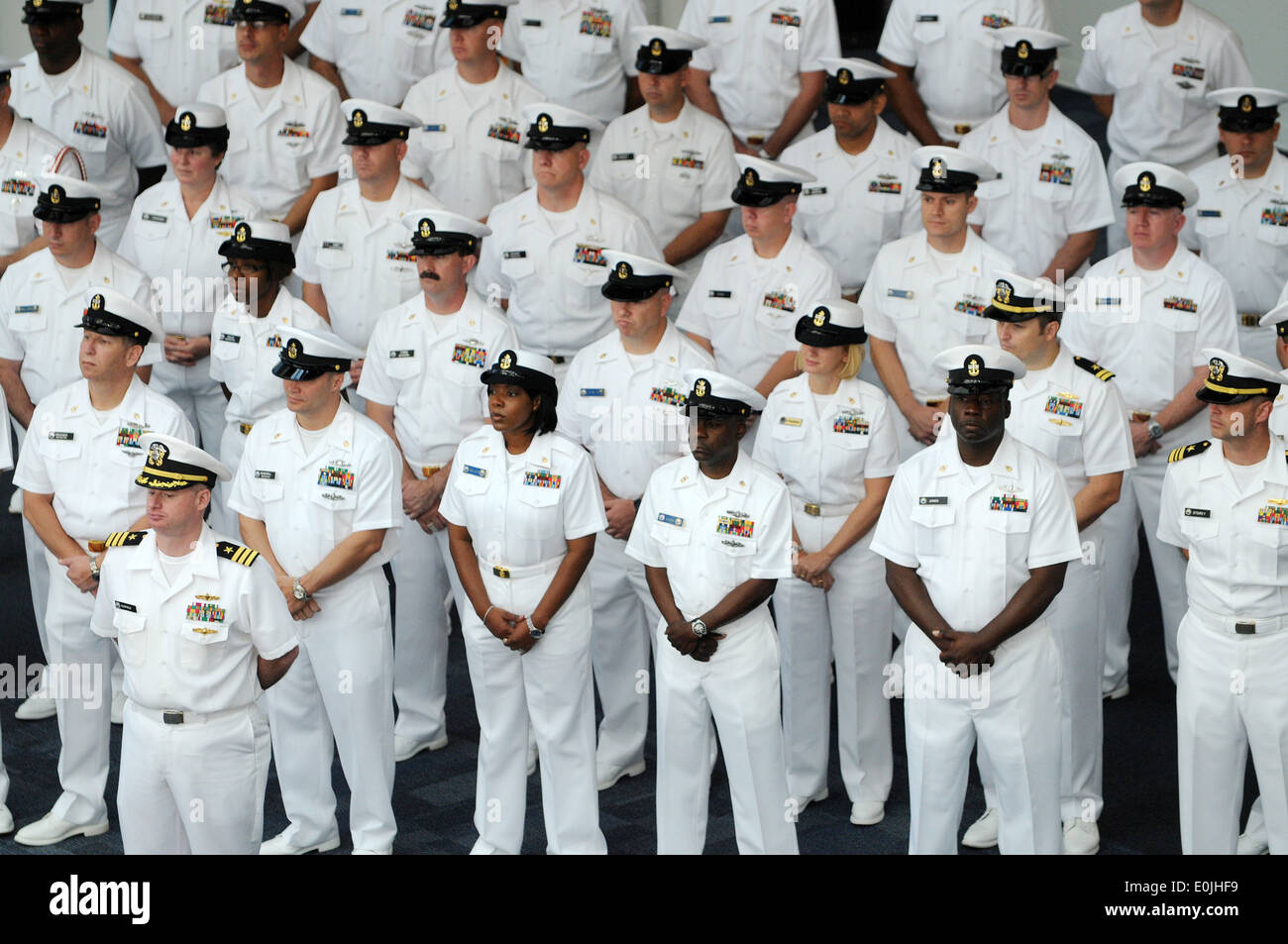 Center for Information Dominance Corry Station officers and chief petty officers attend the CID change of command ceremony at t Stock Photo