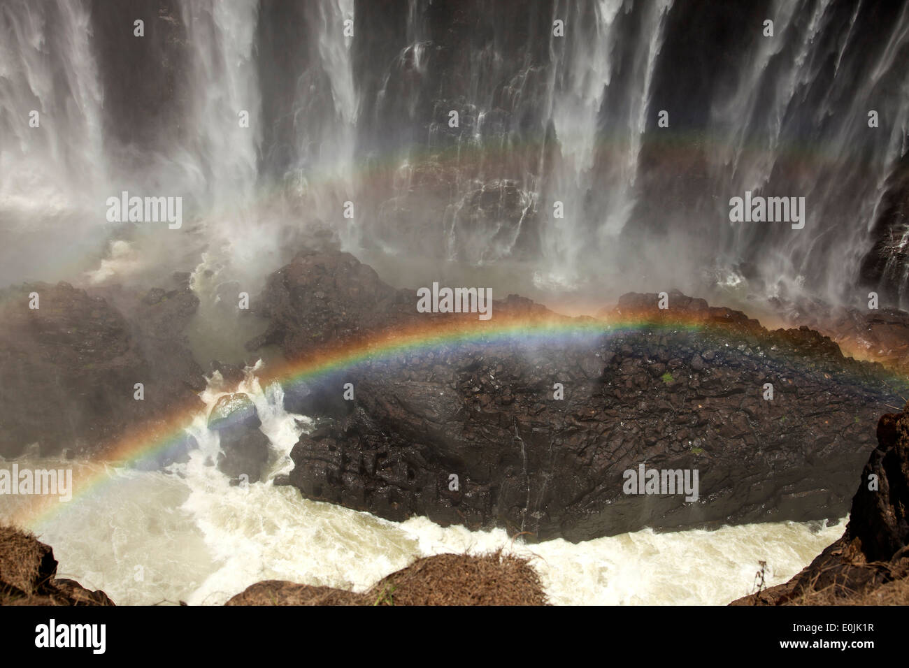 Rainbow at Rainbow Falls, part of the Victoria Falls, Zimbabwe, Africa Stock Photo